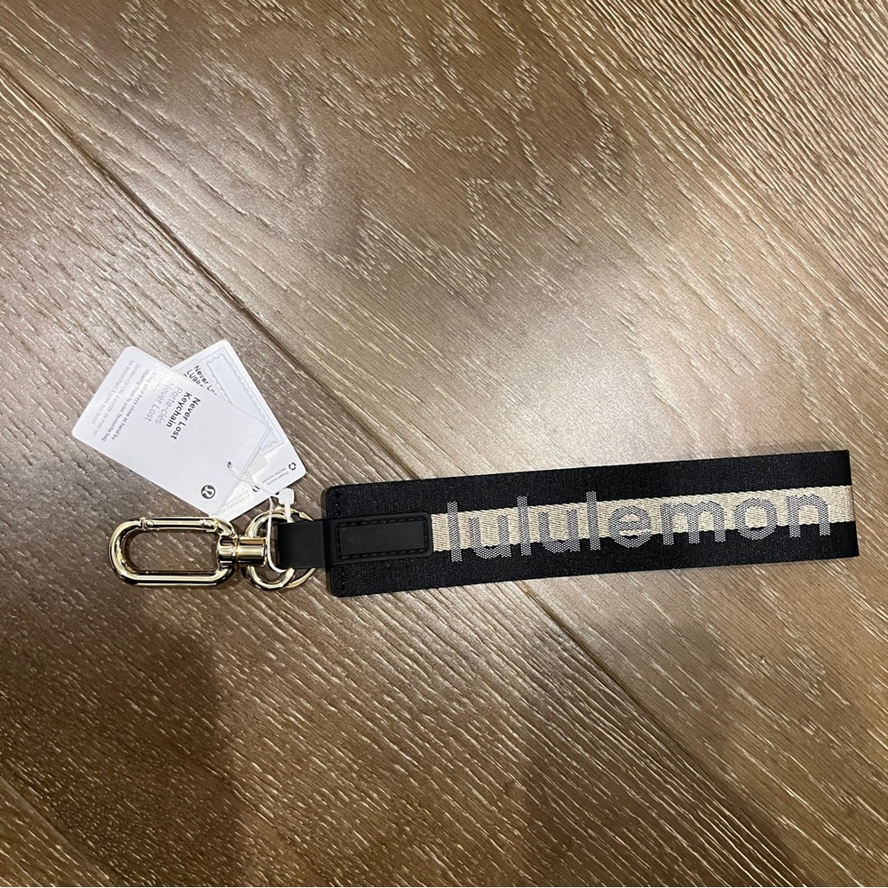 Lululemon Black & Gold Never Lost Key Chain